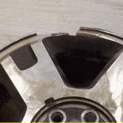 When you damage an alloy wheel so bad it knocks a piece of metal out of the wheel we do not consider it safe to repair.